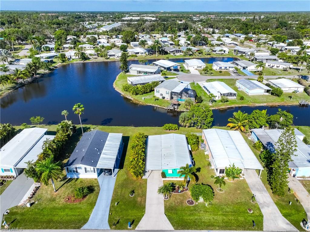 216 Rookery Road Naples, FL 34114 - Photo 37 of 44 an aerial view of residential houses with outdoor space