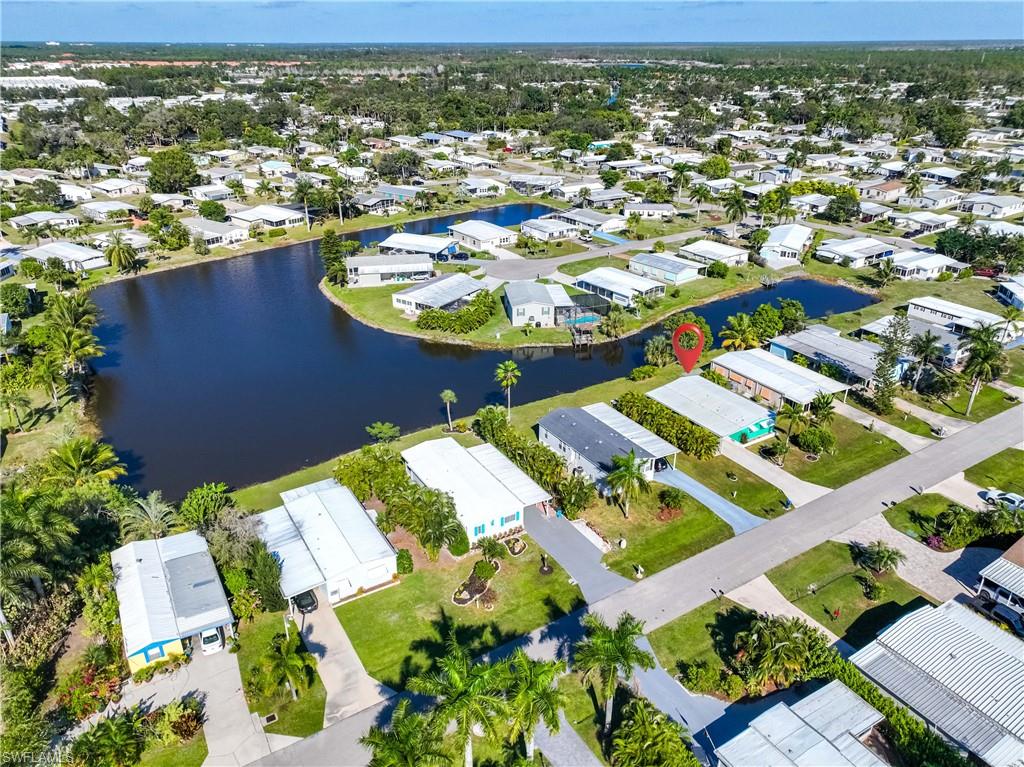216 Rookery Road Naples, FL 34114 - Photo 40 of 44 an aerial view of residential houses with outdoor space