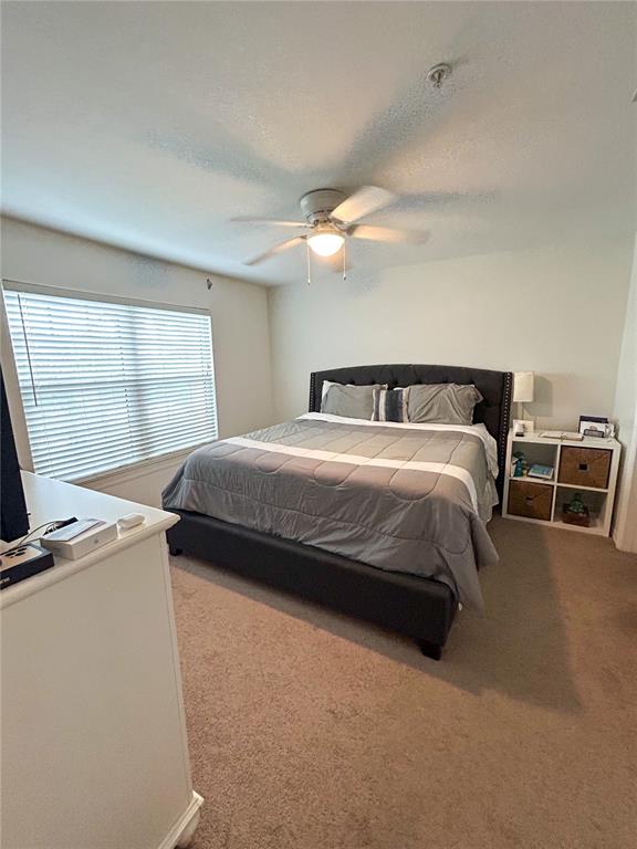 5447 Vineland Road, Unit 1209 Orlando, FL 32811 - Photo 20 of 27 a bedroom with a bed and a window