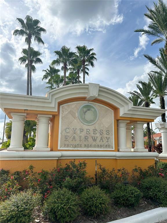 5447 Vineland Road, Unit 1209 Orlando, FL 32811 - Photo 26 of 27 a front view of a house with a yard