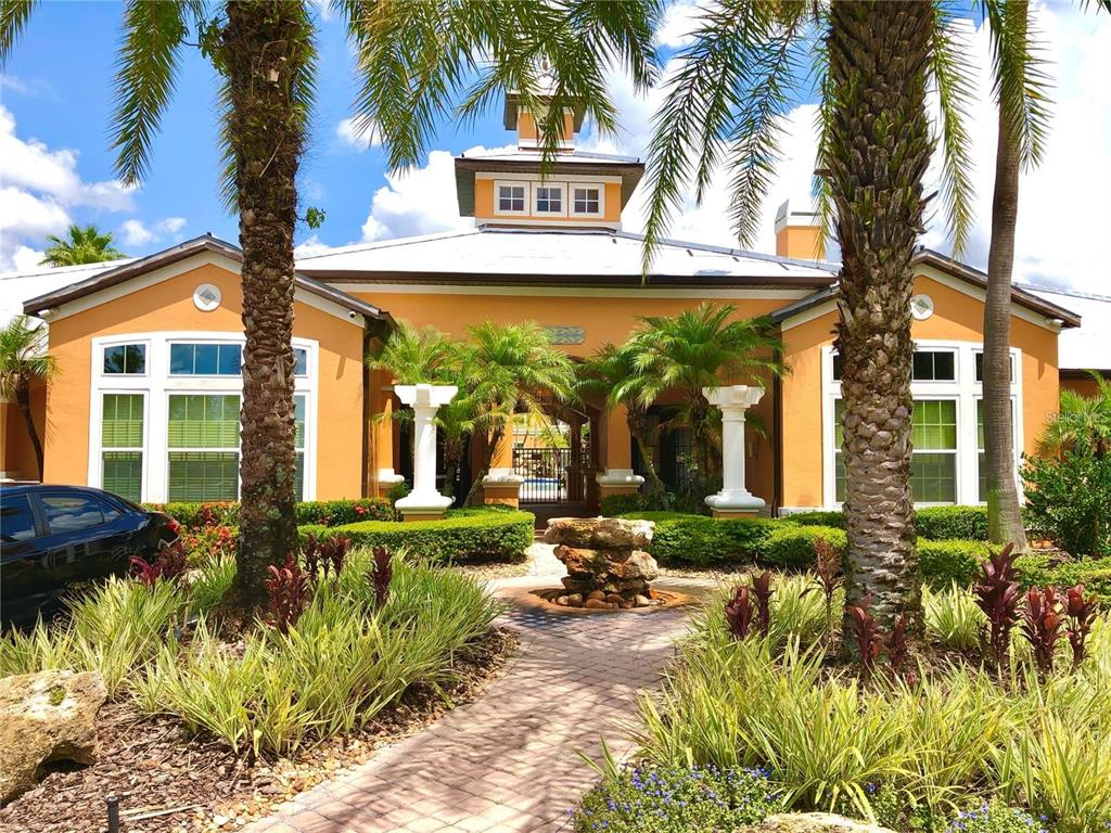 5447 Vineland Road, Unit 1209 Orlando, FL 32811 - Photo 27 of 27 a front view of a house having yard