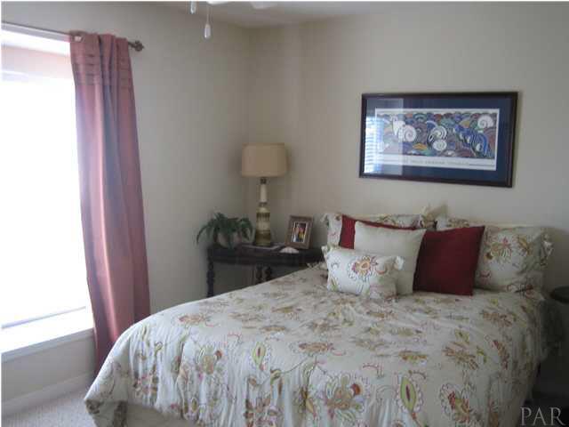 16076 Innerarity Point Road Pensacola, FL 32507 - Photo 15 of 24 Additional bedroom on level three with a view of the intracoastal waterway and Ono Island.