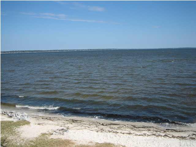 16076 Innerarity Point Road Pensacola, FL 32507 - Photo 21 of 24 Sit on the beach at the bay and watch the dolphins play.