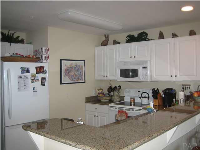 16076 Innerarity Point Road Pensacola, FL 32507 - Photo 8 of 24 You will enjoy the view as you cook in the kitchen.