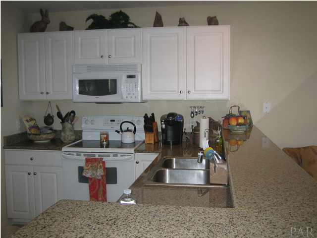 16076 Innerarity Point Road Pensacola, FL 32507 - Photo 9 of 24 Plenty of counterspace and cabinets.