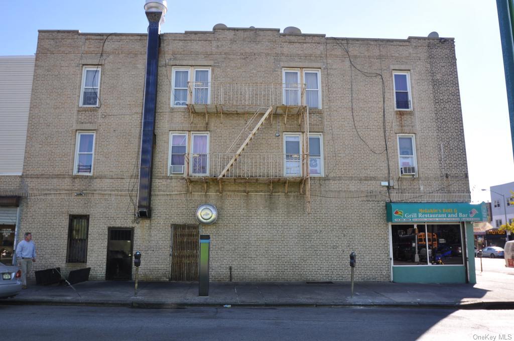 1248 Castle Hill Avenue Bronx, NY 10462 - Photo 2 of 2 View of building exterior featuring cooling unit
