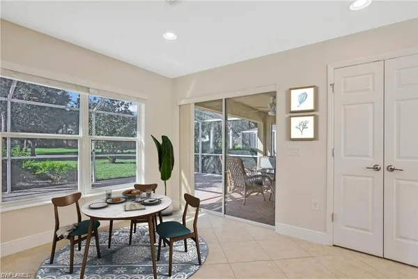 a workspace with furniture and a window