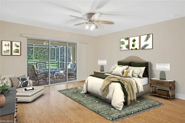a bedroom with a bed and a couch