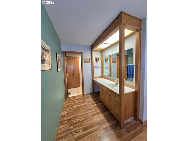 a view of a hallway with front door