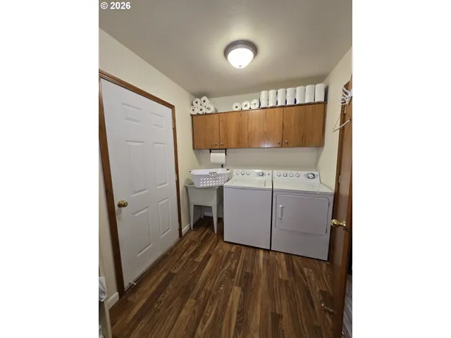 a room with a sink and cabinets