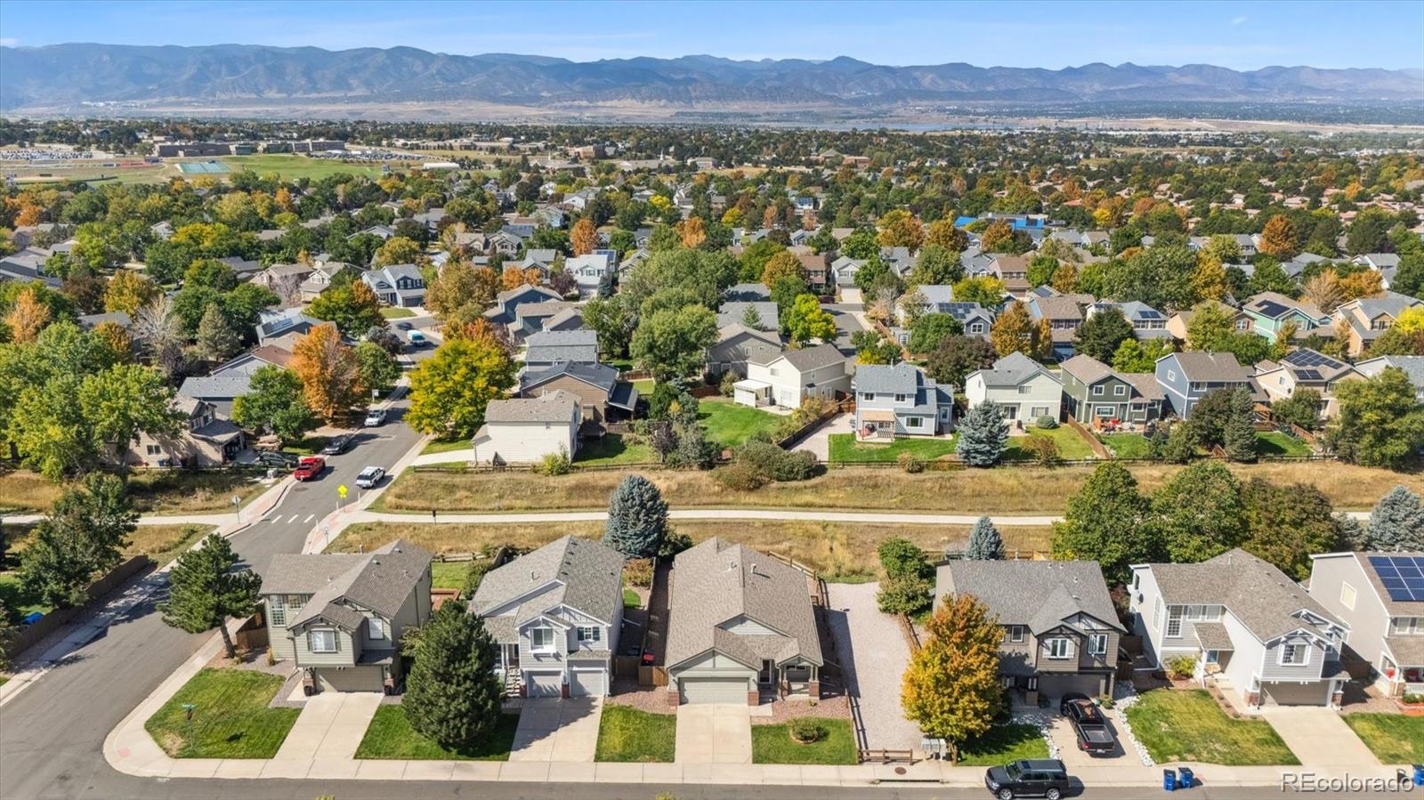 9793 Burberry Way Highlands Ranch, CO 80129 - Photo 27 of 29 an aerial view of residential building and trees
