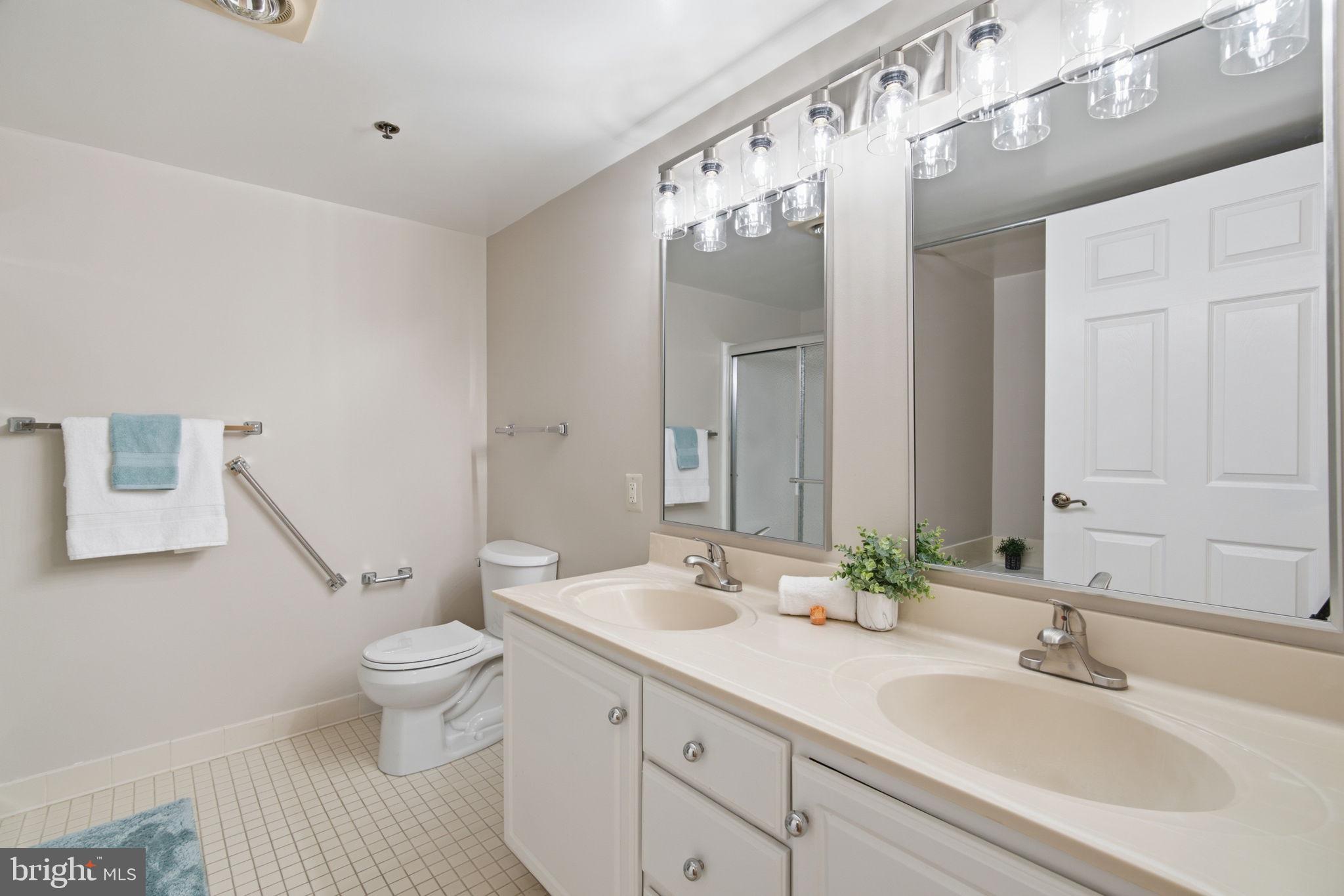 14805 Pennfield Circle, Unit 304 Silver Spring, MD 20906 - Photo 20 of 38 Primary Bathroom with double vanity