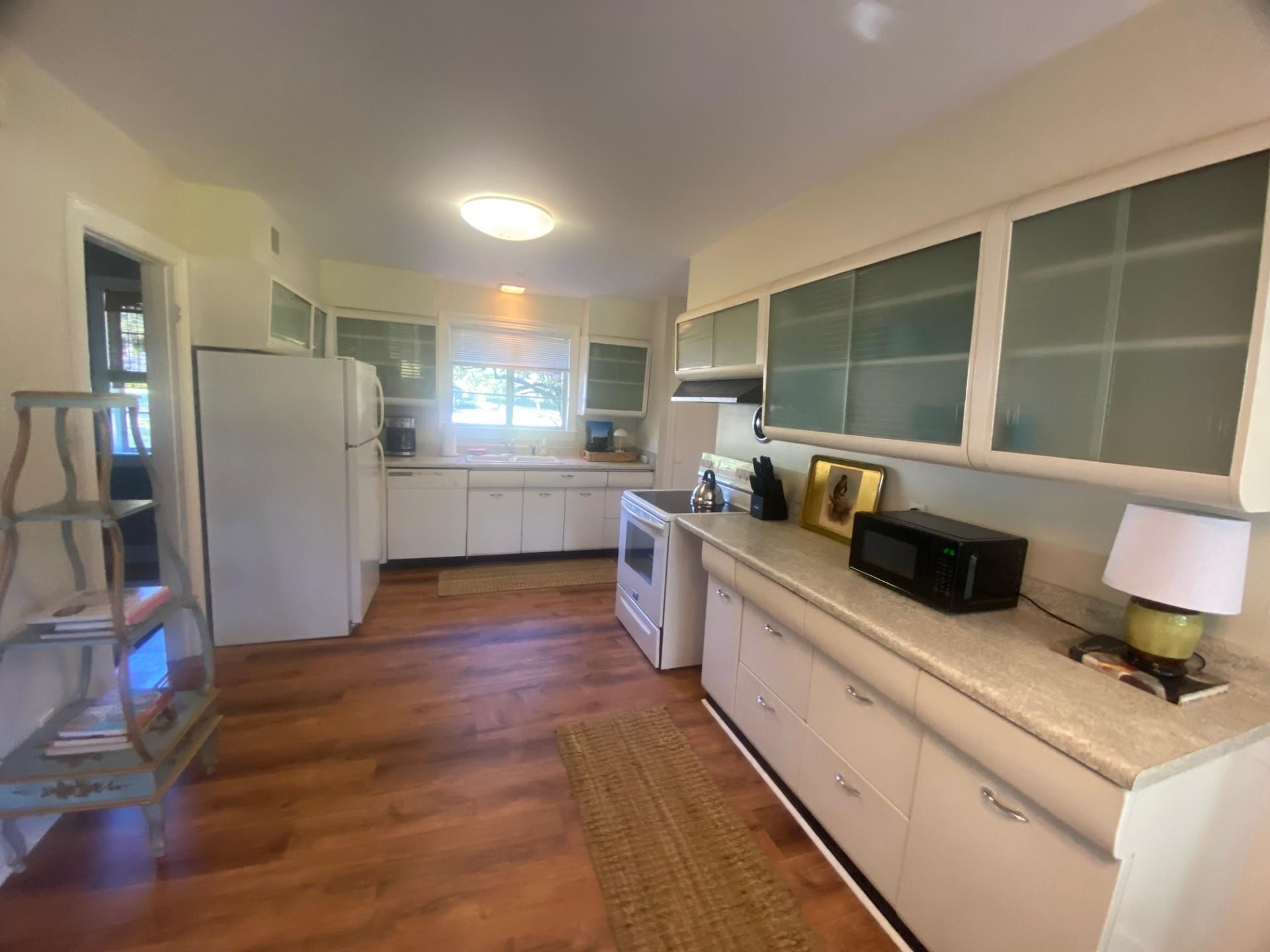 40 North Acres Drive Jackson, TN 38301 - Photo 22 of 24 a kitchen with refrigerator and window