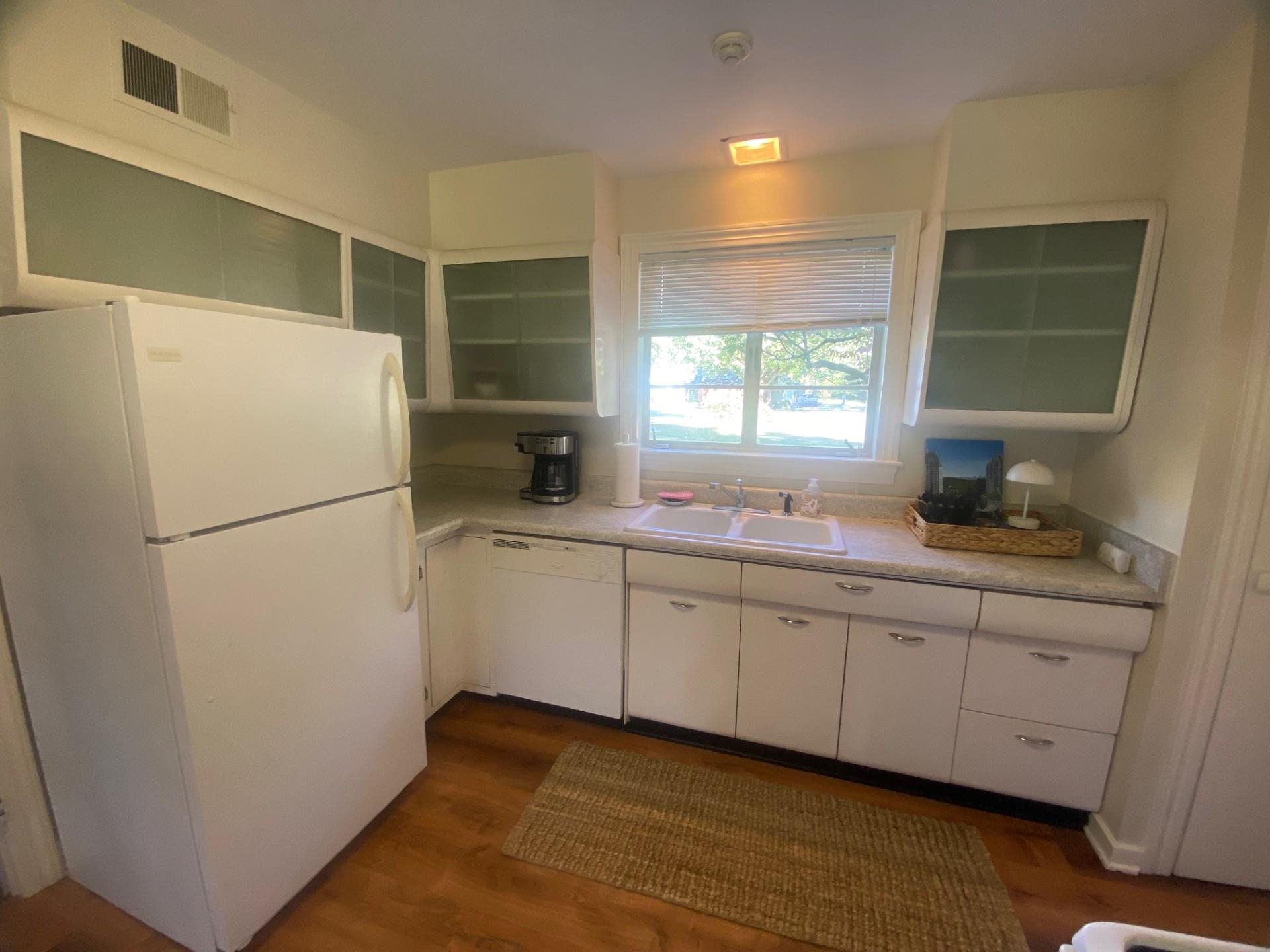 40 North Acres Drive Jackson, TN 38301 - Photo 23 of 24 a kitchen with refrigerator and window