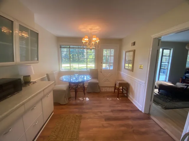 a view of a livingroom with furniture and windows