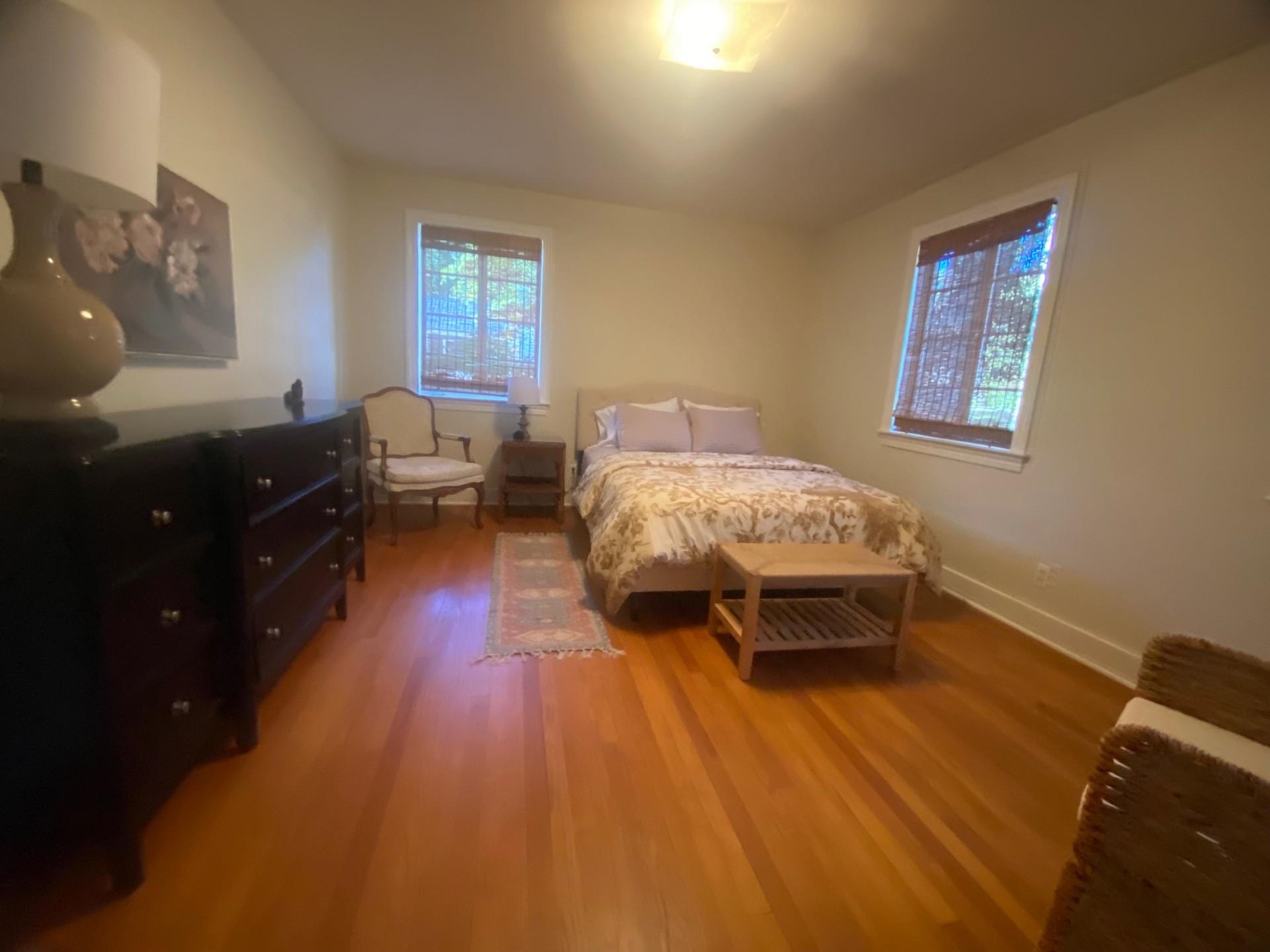 40 North Acres Drive Jackson, TN 38301 - Photo 10 of 24 a bedroom with a bed and wooden floor