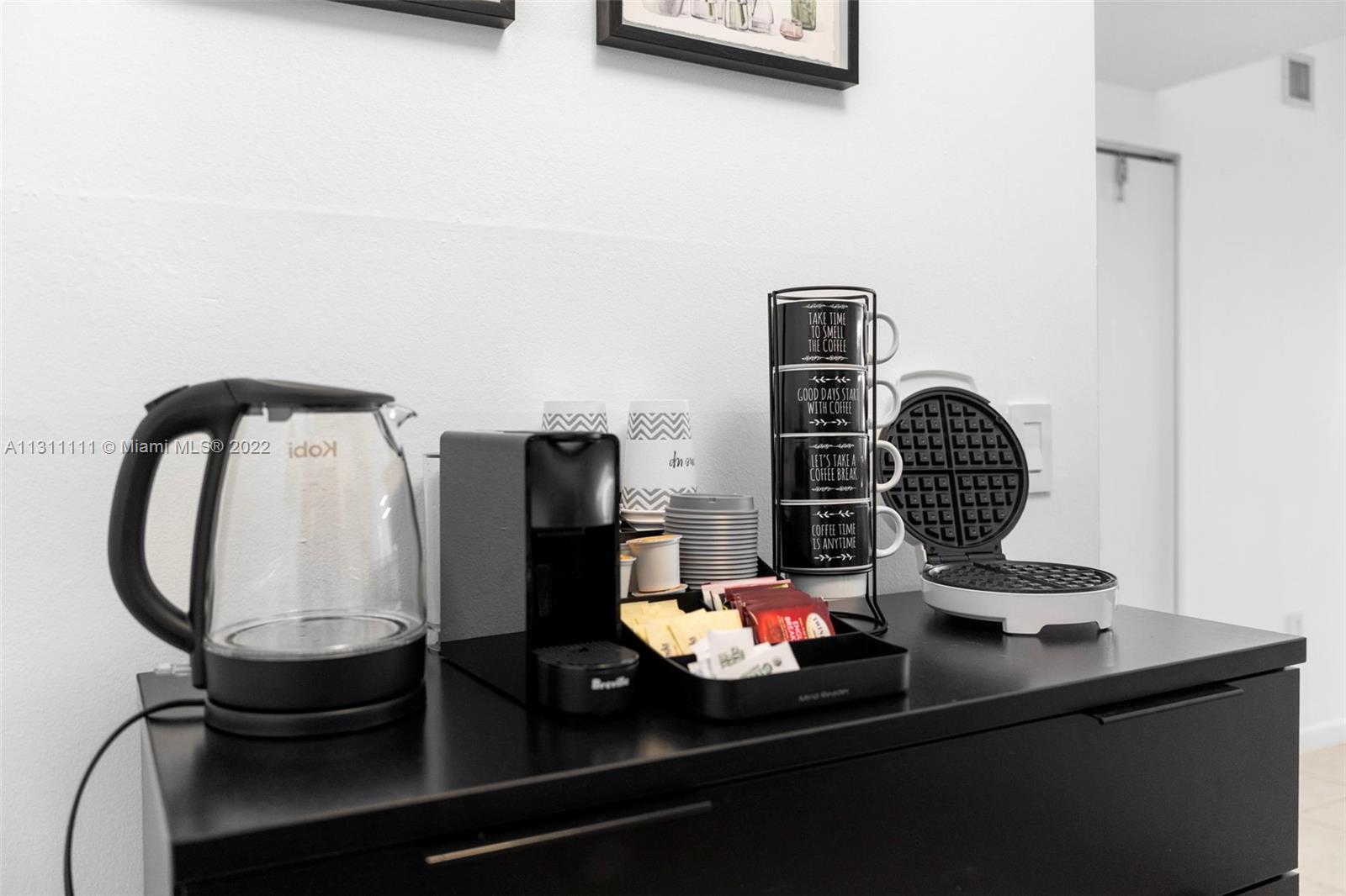 18100 North Bay Road, Unit 308 Sunny Isles Beach, FL 33160 - Photo 25 of 35 a bathroom with a sink and a mirror