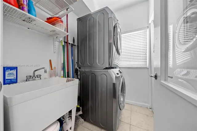 a utility room with dryer and washer