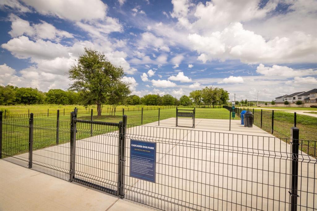 4907 Escape Rivera Drive Austin, TX 78747 - Photo 18 of 28 A community dog park offers ample green space and a safe, fenced area for pets.