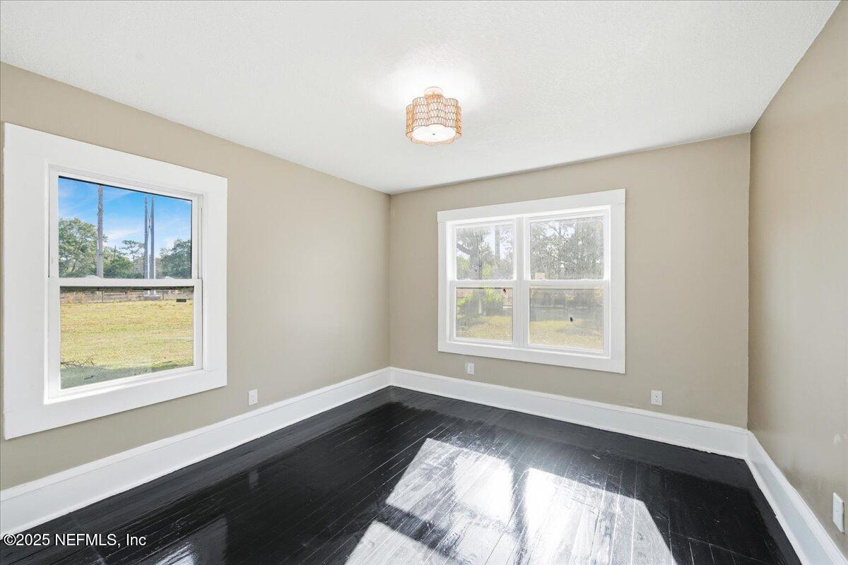 9671 Old Plank Road Jacksonville, FL 32220 - Photo 29 of 62 a view of an empty room with a window