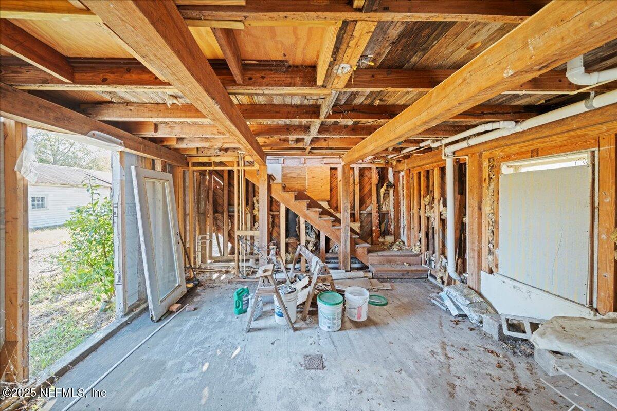 9671 Old Plank Road Jacksonville, FL 32220 - Photo 39 of 62 a view of an empty room with wooden floor