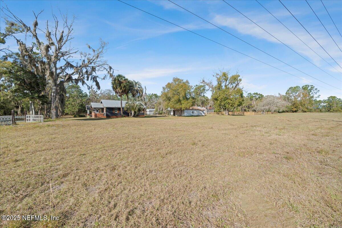 9671 Old Plank Road Jacksonville, FL 32220 - Photo 45 of 62 a view of a outdoor space with trees