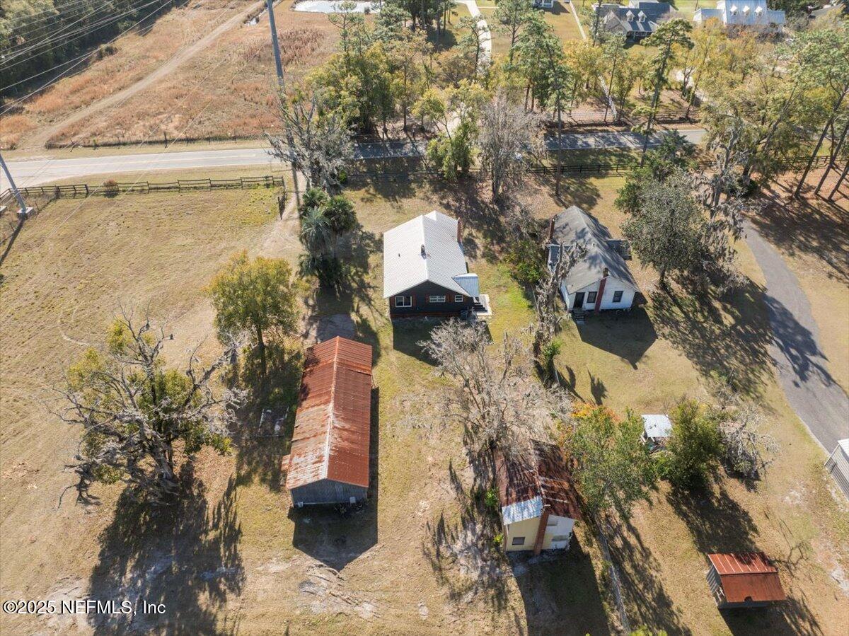 9671 Old Plank Road Jacksonville, FL 32220 - Photo 53 of 62 a view of a yard