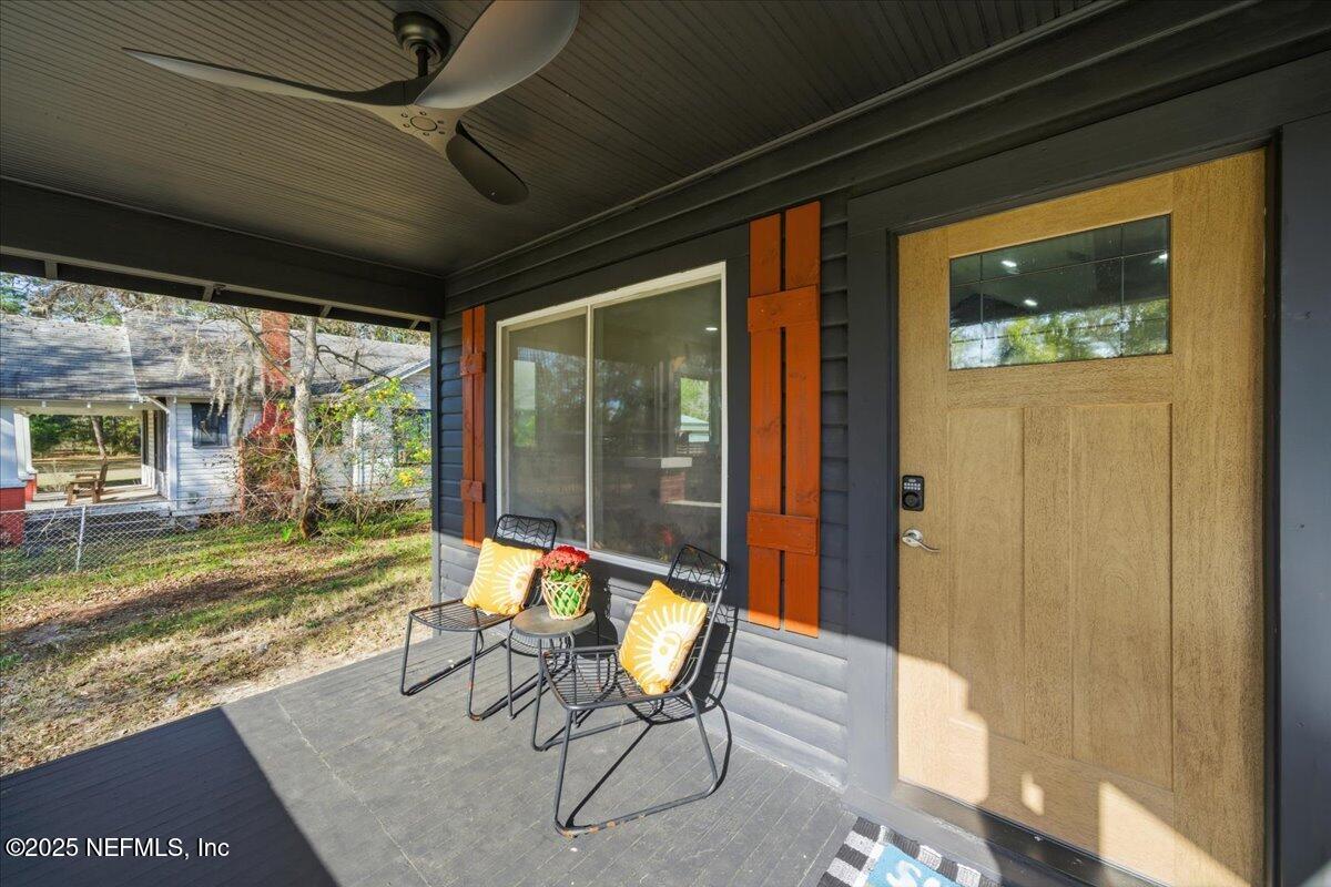 9671 Old Plank Road Jacksonville, FL 32220 - Photo 7 of 62 a view of two chairs in the balcony