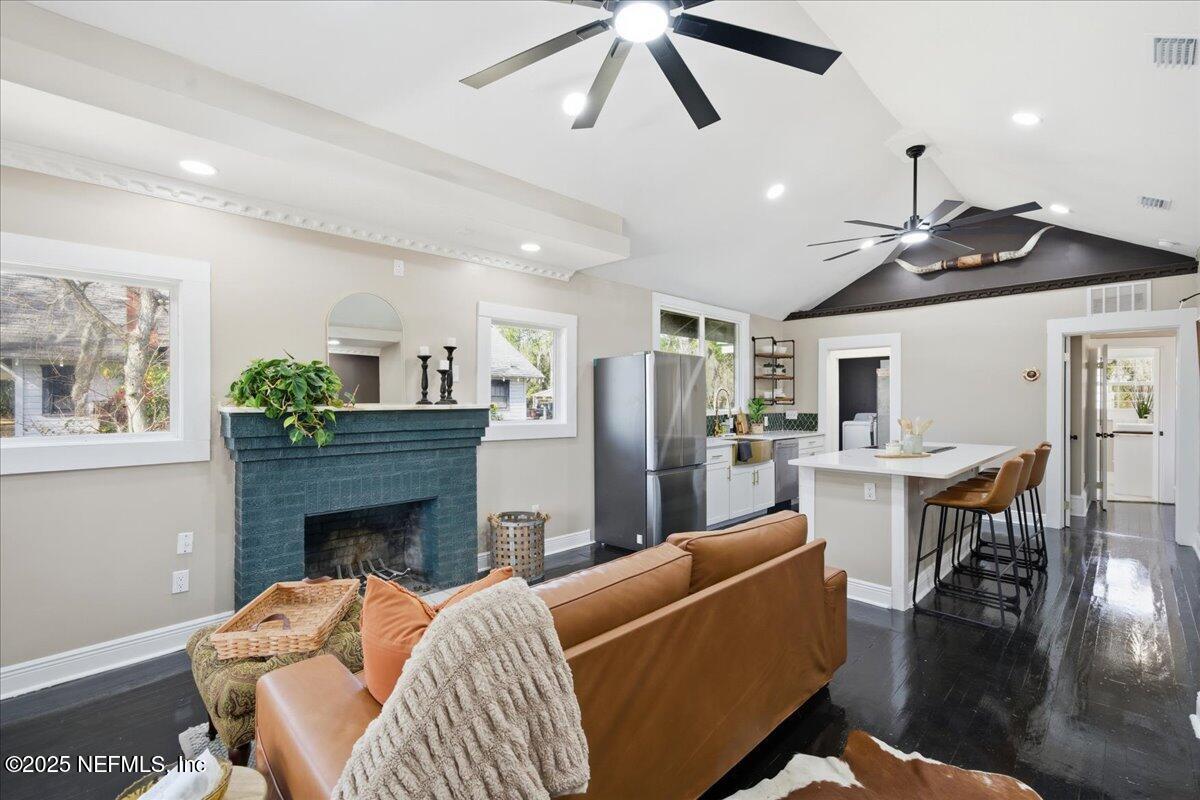 9671 Old Plank Road Jacksonville, FL 32220 - Photo 9 of 62 a living room with furniture and a fireplace