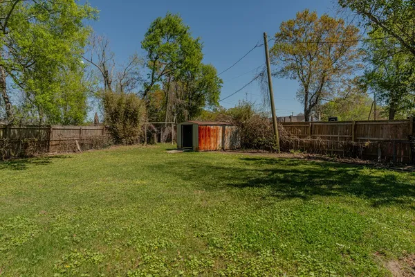 a view of a backyard with a garden