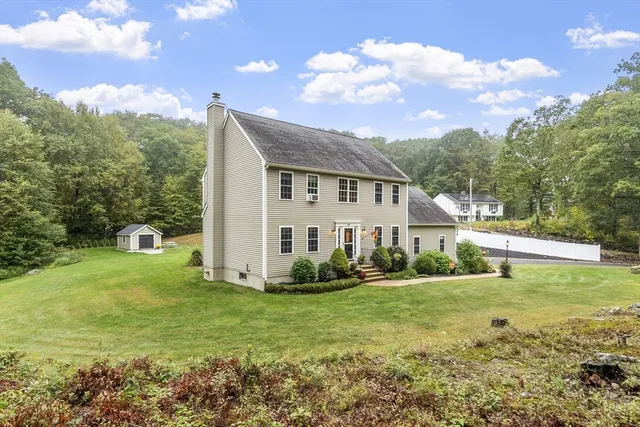 a house view with a garden space