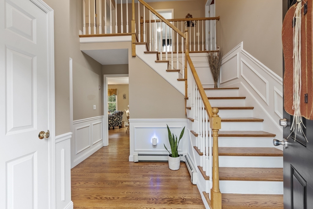 74 King Road Charlton, MA 01507 - Photo 16 of 38 a view of entryway and hall with wooden floor