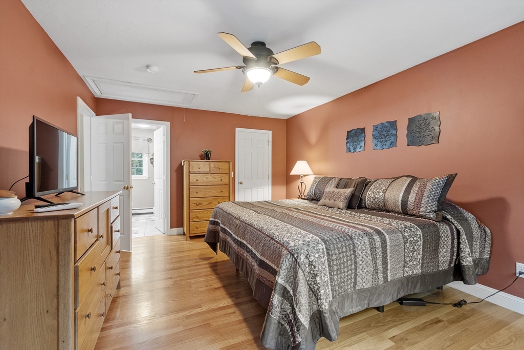 74 King Road Charlton, MA 01507 - Photo 20 of 38 a bed room with a bed and a television