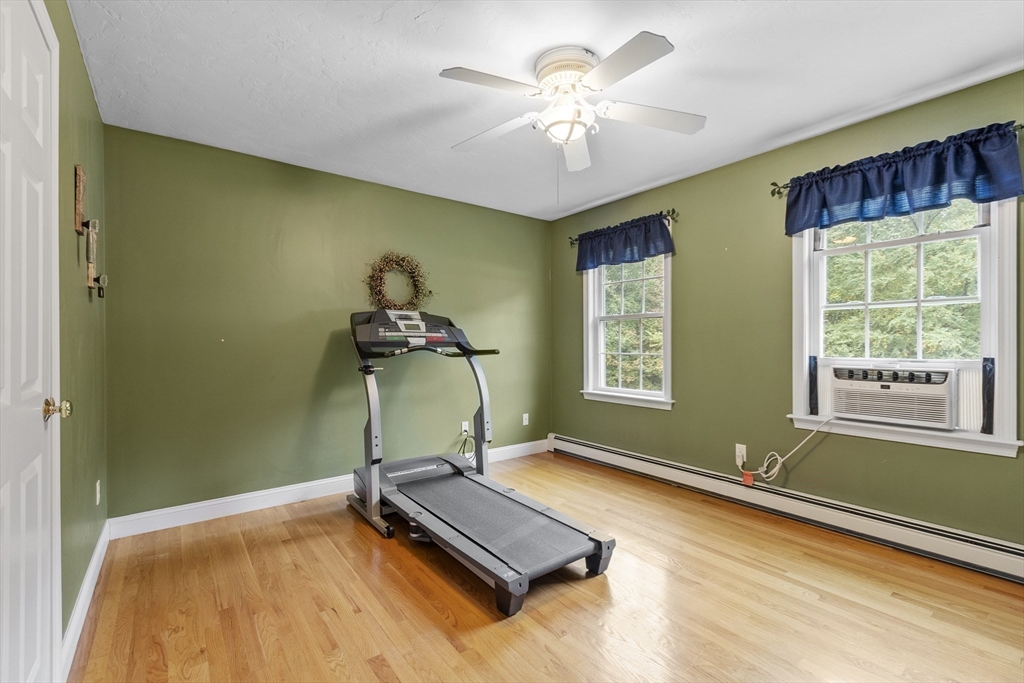 74 King Road Charlton, MA 01507 - Photo 24 of 38 a room with gym equipment and a window