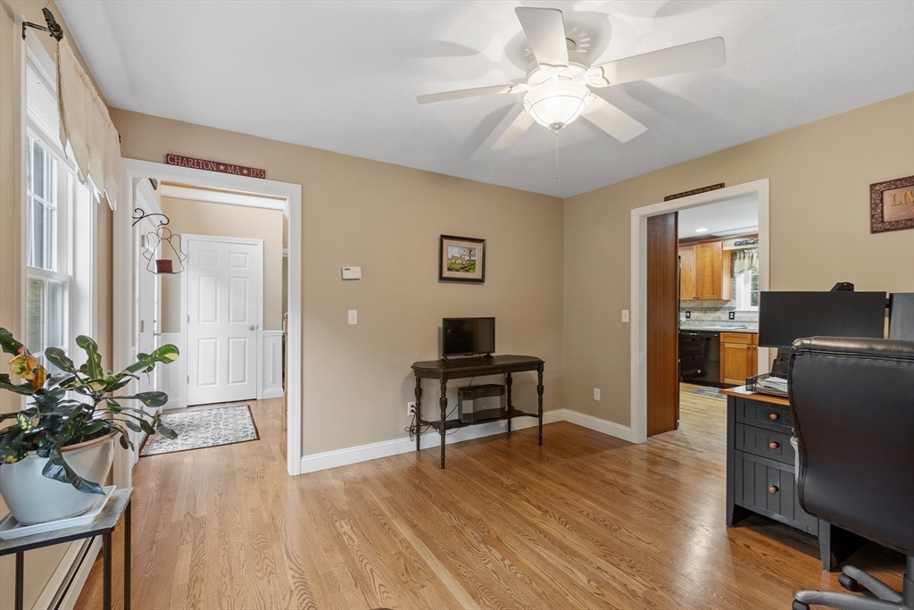 74 King Road Charlton, MA 01507 - Photo 28 of 38 a living room with furniture and a potted plant