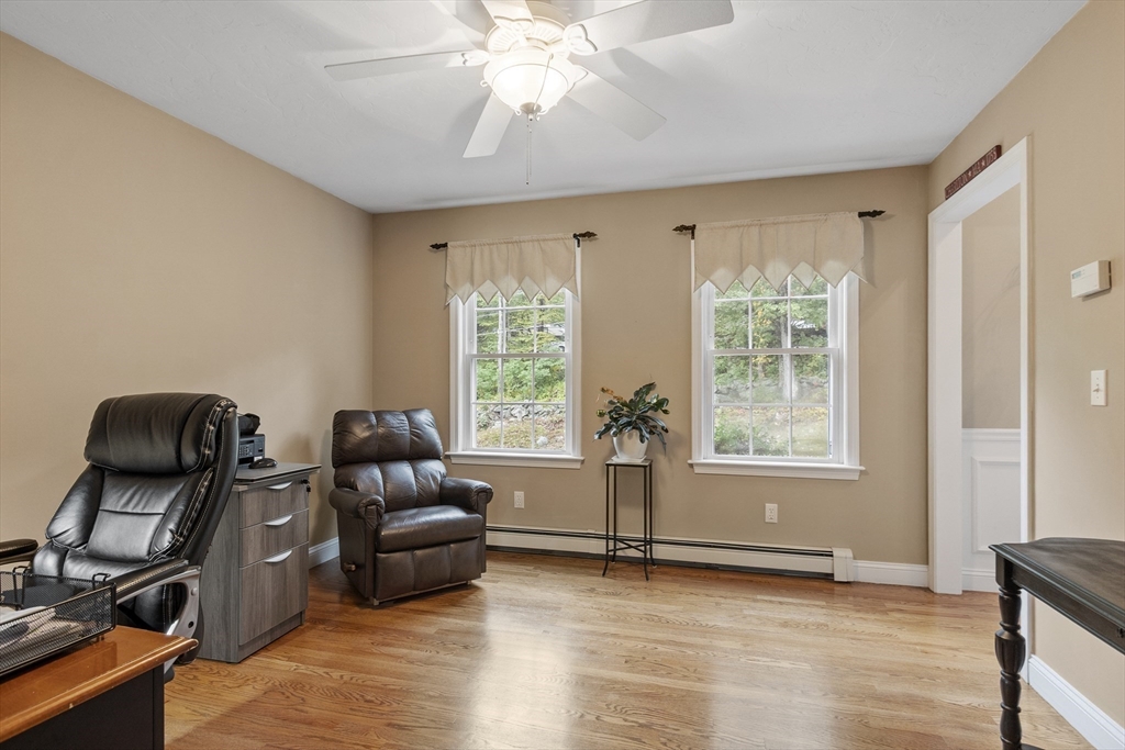 74 King Road Charlton, MA 01507 - Photo 29 of 38 a living room with furniture and a window