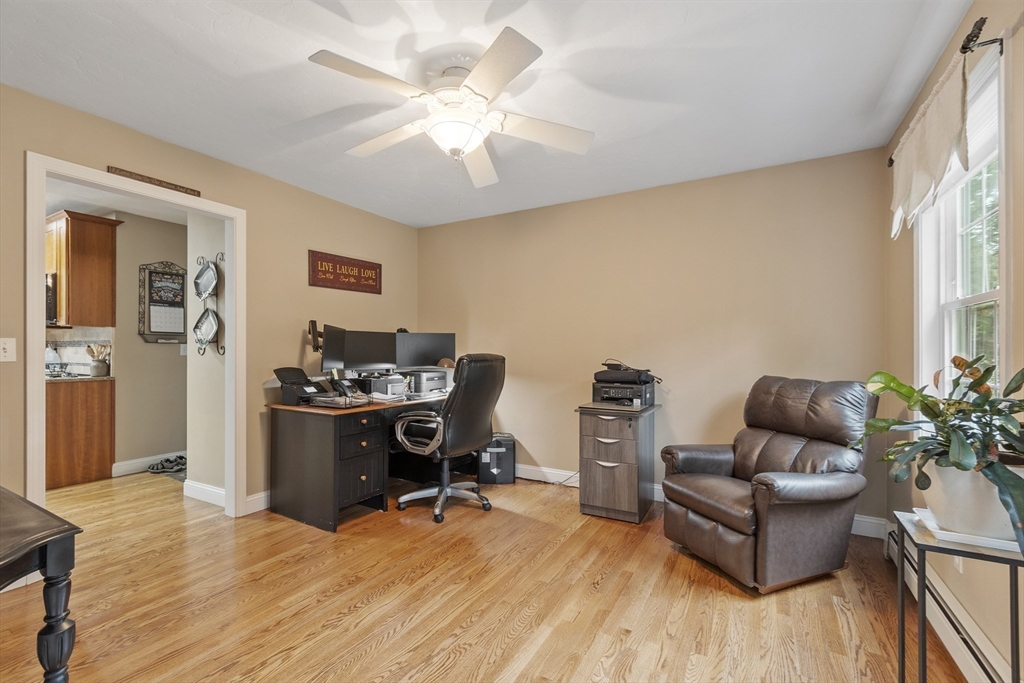 74 King Road Charlton, MA 01507 - Photo 30 of 38 a living room with furniture and wooden floor
