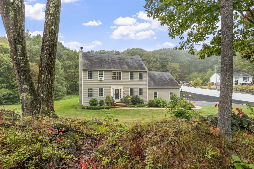 74 King Road Charlton, MA 01507 - Photo 37 of 38 a view of a house with backyard and garden