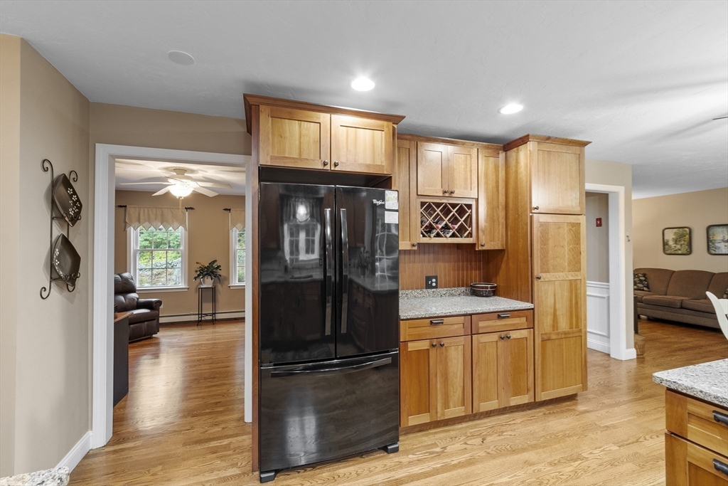 74 King Road Charlton, MA 01507 - Photo 4 of 38 a kitchen with a refrigerator and a sink