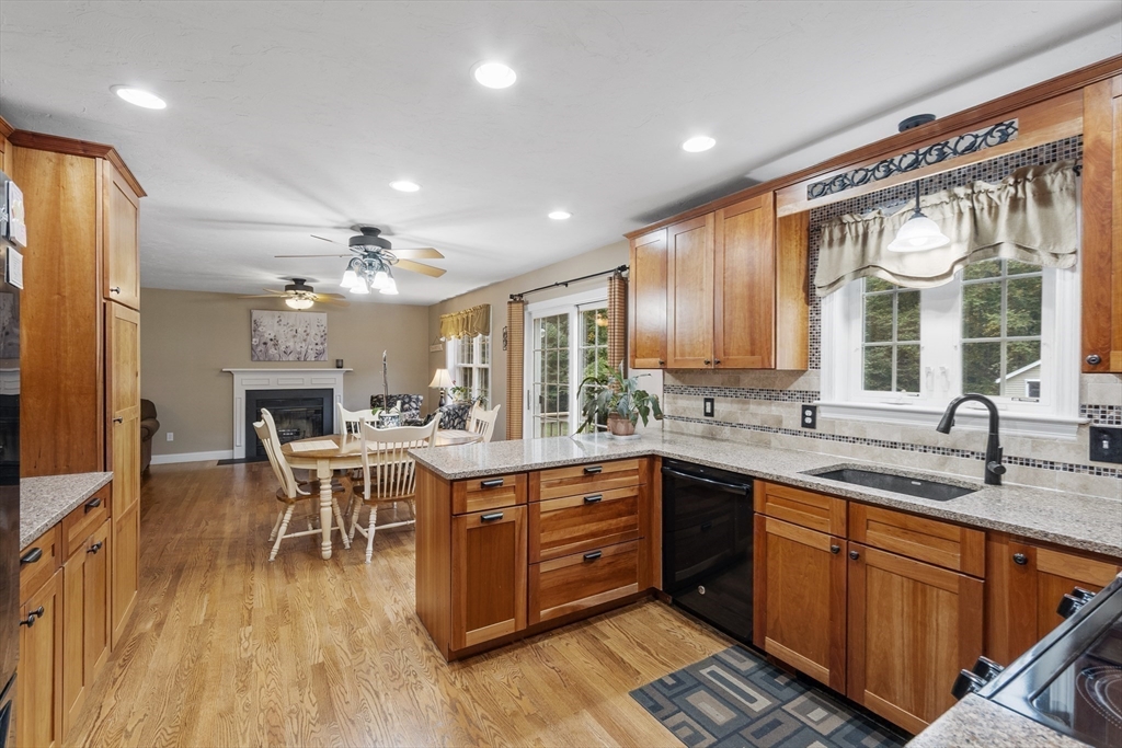 74 King Road Charlton, MA 01507 - Photo 5 of 38 a kitchen with lots of counter top space and dining table