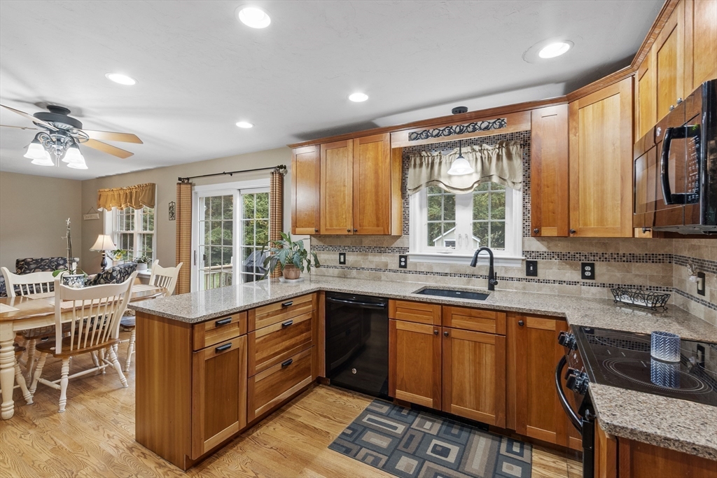 74 King Road Charlton, MA 01507 - Photo 7 of 38 a kitchen with a sink stove and cabinets