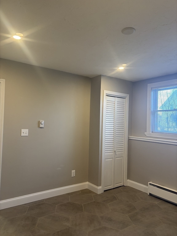 86 East Main Street Ayer, MA 01432 - Photo 29 of 35 an empty room with windows