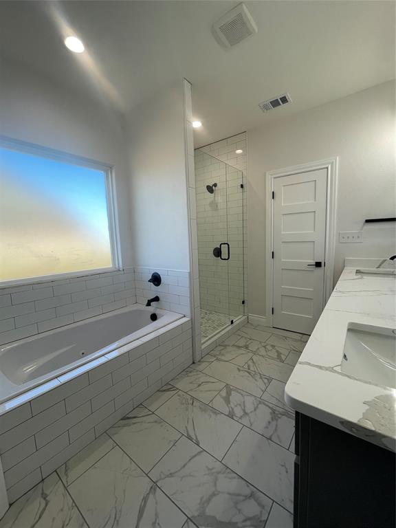 35 Old Sanborn Ranch Road Whitesboro, TX 76273 - Photo 8 of 9 a bathroom with a bathtub and a sink