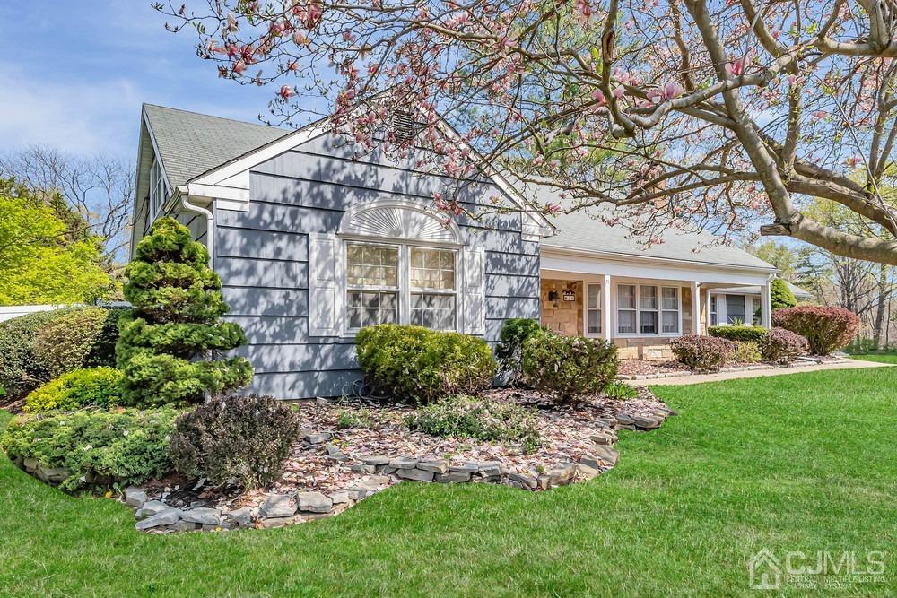 24 Crabtree Road Old Bridge, NJ 07747 - Photo 3 of 47 a front view of a house with a garden