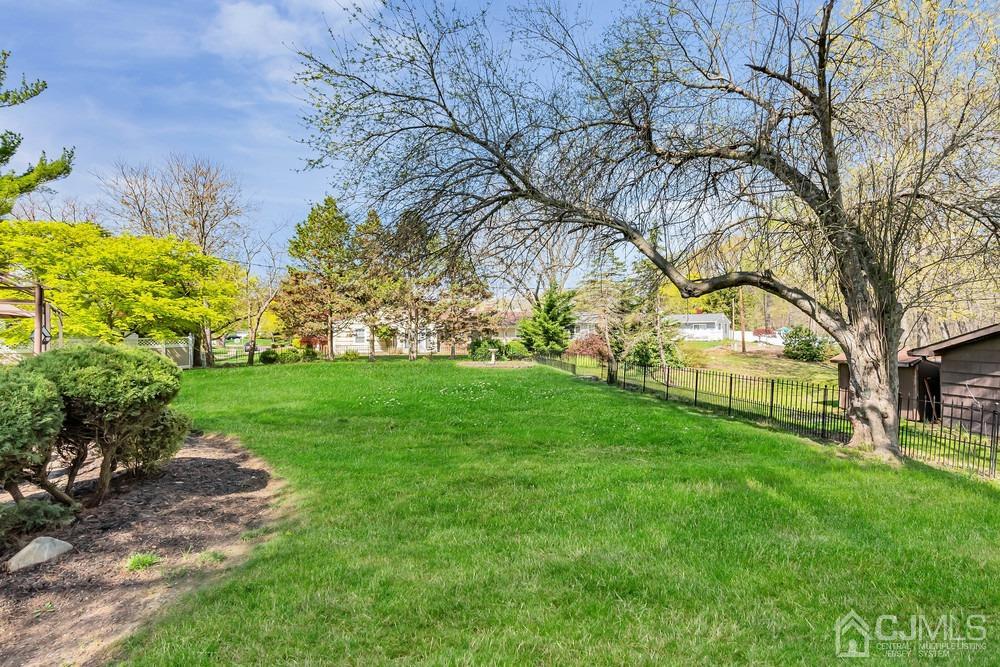 24 Crabtree Road Old Bridge, NJ 07747 - Photo 40 of 47 a view of yard with tree s