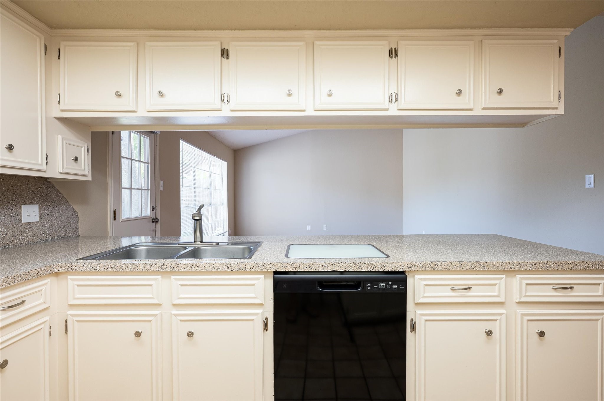 9306 Sanford Road Houston, TX 77031 - Photo 11 of 29 a kitchen with granite countertop a sink and cabinets