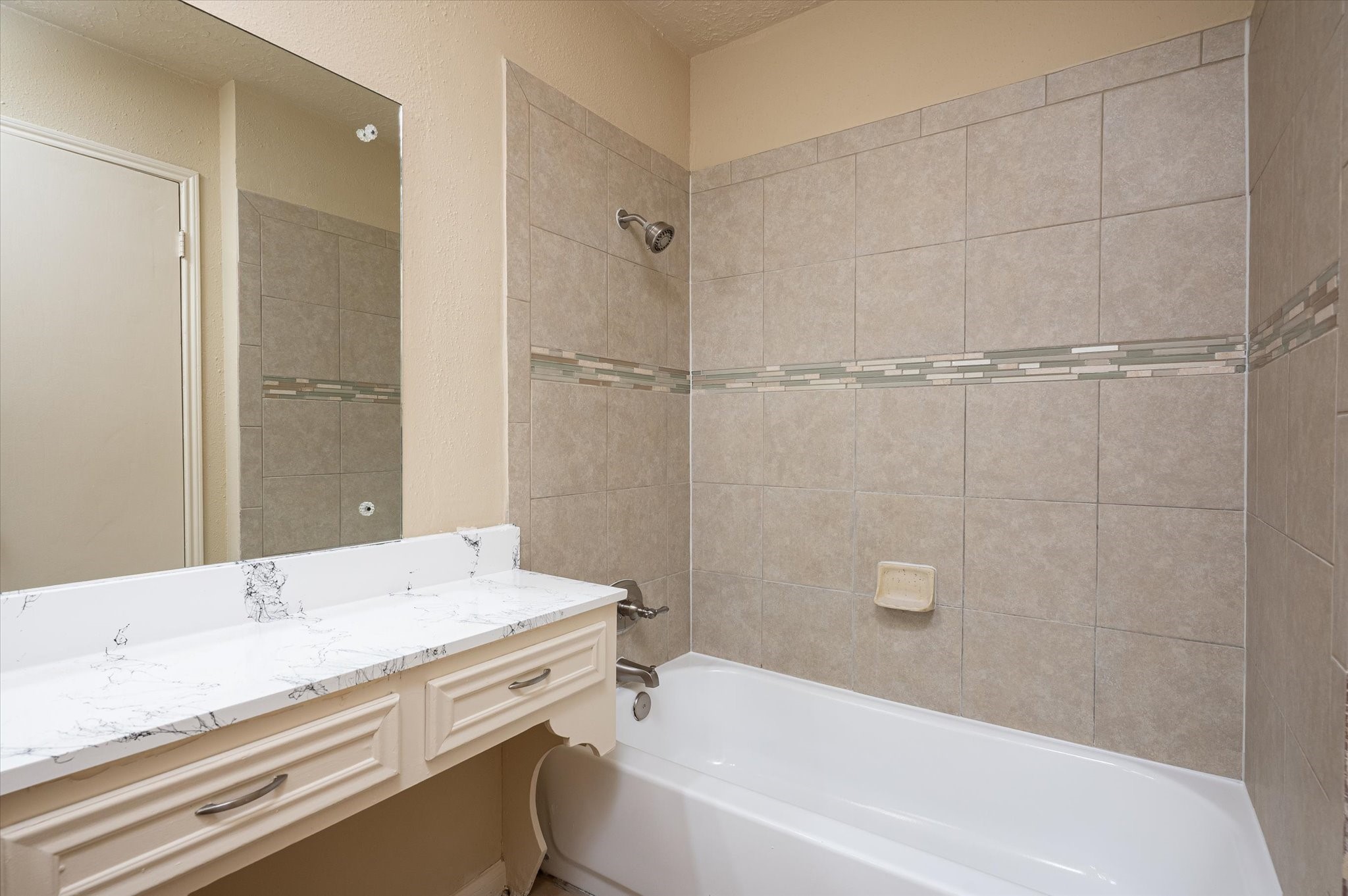 9306 Sanford Road Houston, TX 77031 - Photo 22 of 29 a bathroom with a granite countertop sink a toilet and shower