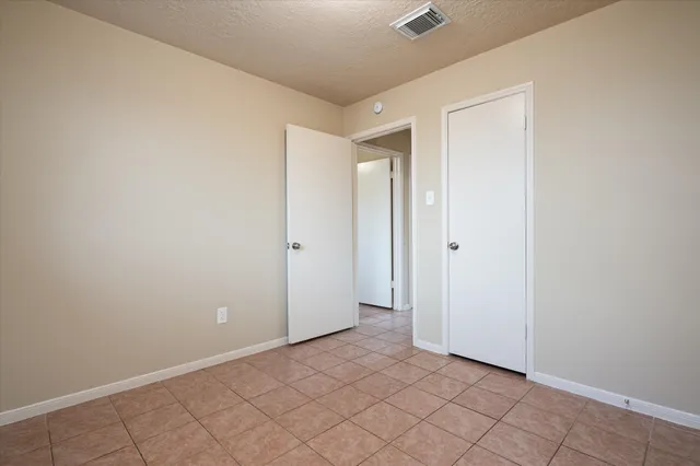 a view of a house with a back yard