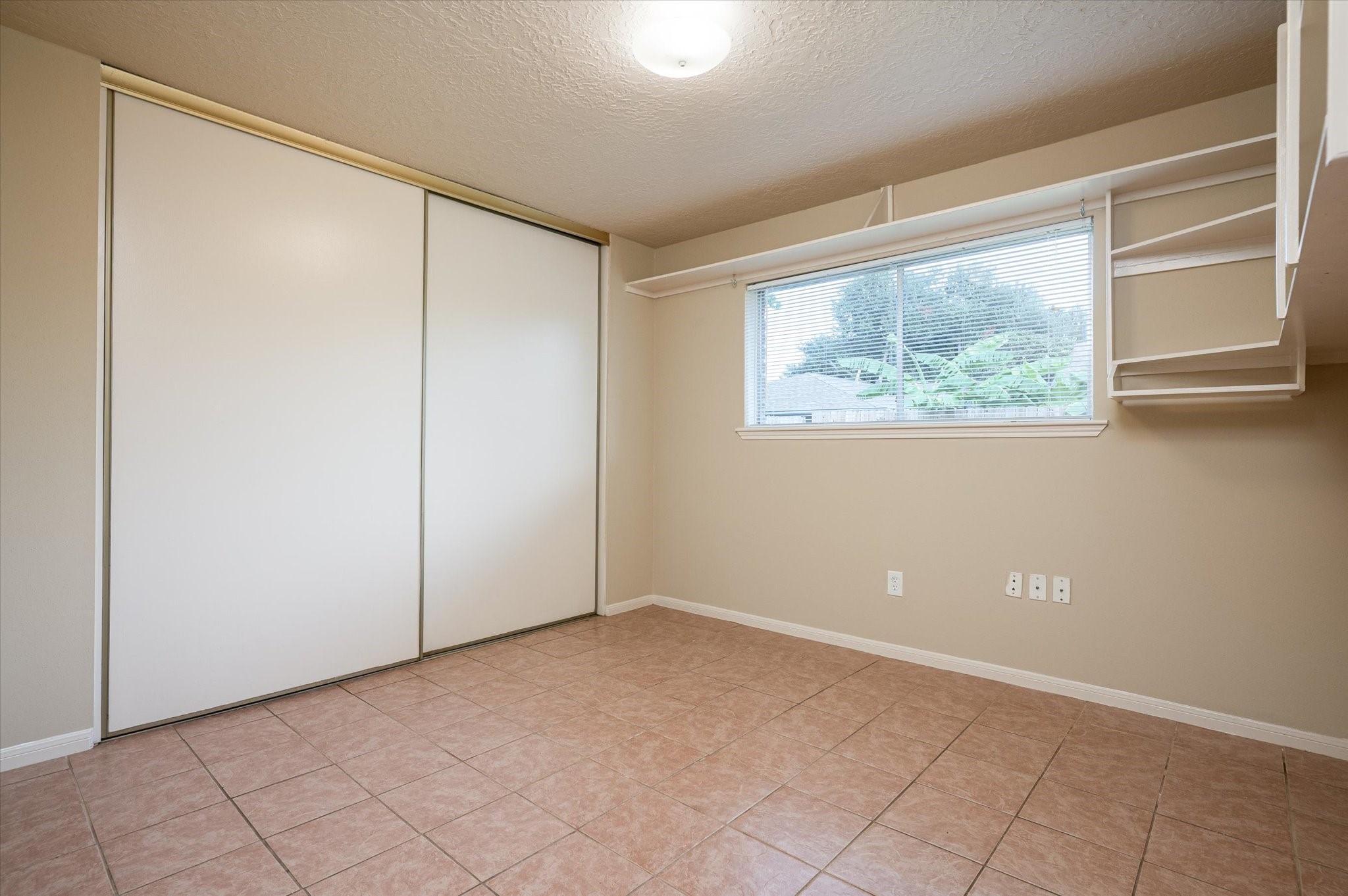 9306 Sanford Road Houston, TX 77031 - Photo 25 of 29 an empty room with a window