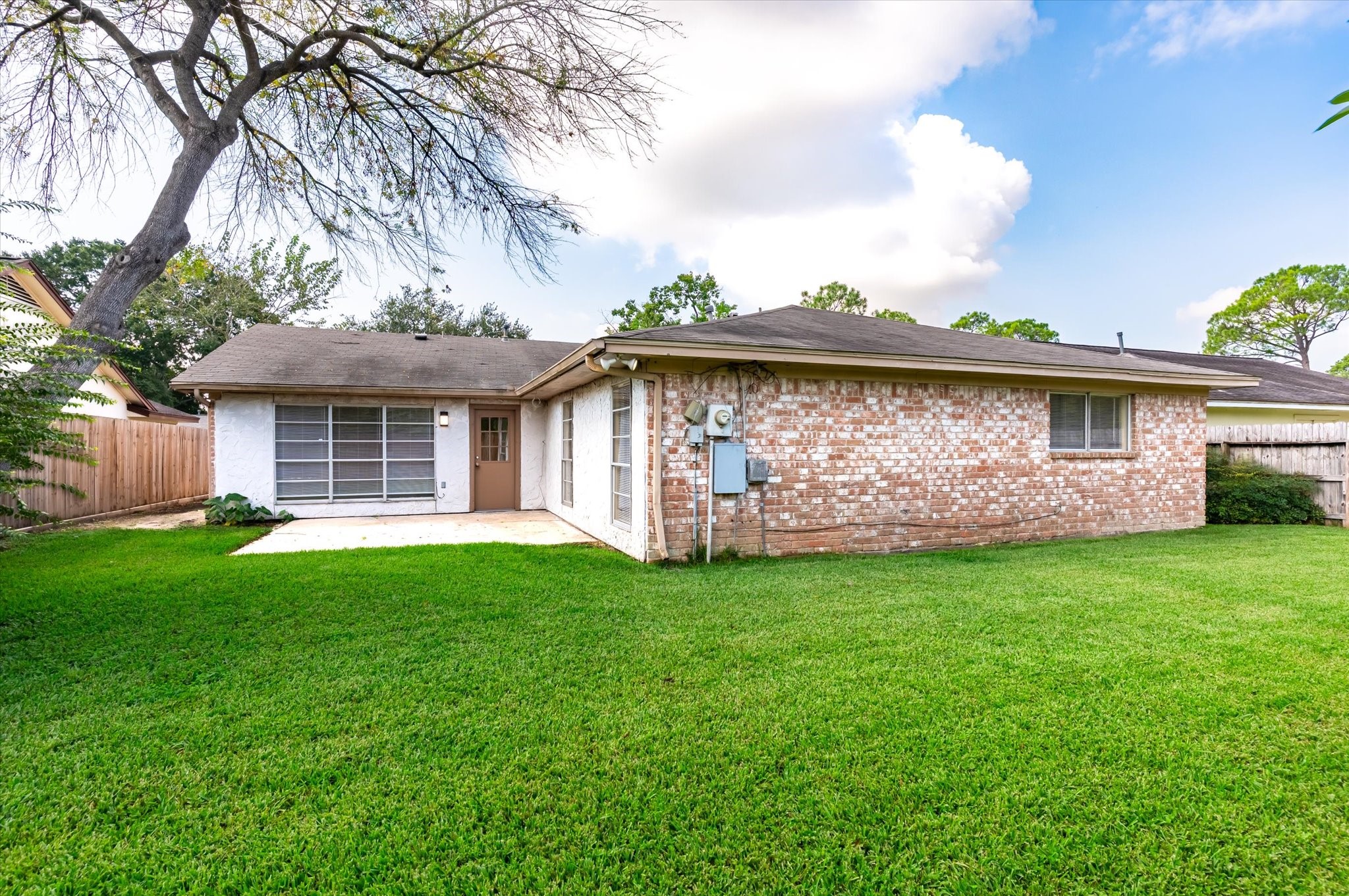 9306 Sanford Road Houston, TX 77031 - Photo 27 of 29 a view of a house with a back yard